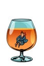 Drunkard in brandy glass Royalty Free Stock Photo