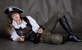Drunken girl - pirate with pistol and bottle Royalty Free Stock Photo