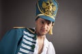 Drunken Russian hussar on gray background Royalty Free Stock Photo