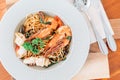 Drunken spaghetti with seafood on white plate is modern Thai fusion food Royalty Free Stock Photo