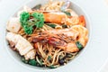 Drunken spaghetti with seafood on white plate is modern Thai fusion food Royalty Free Stock Photo