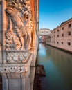 Drunkenness of Noah Sculpture and Bridge of Sighs at Sunrise, Ve Royalty Free Stock Photo