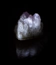 Druse of pink amethyst mineral crystals from Tian Shan mountains. A photo of a stone isolated on black. For geology websites,