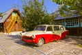 DRVENGRAD, SERBIA - SEPTEMBER 03: Retro cars in traditional village Drvengrad Mecavnik on September 03, 2015 in Drvengrad, Serbia