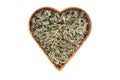 Dry Absinth wormwood medical herbs in heart form basket isolated Royalty Free Stock Photo