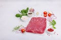 Dry aged Bavette steak with traditional spices and herbs. Fresh raw meat cut, light stone background Royalty Free Stock Photo