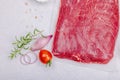 Dry aged Bavette steak with traditional spices and herbs. Fresh raw meat cut, light stone background Royalty Free Stock Photo