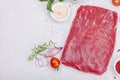 Dry aged Bavette steak with traditional spices and herbs. Fresh raw meat cut, light stone background Royalty Free Stock Photo