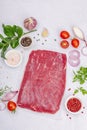 Dry aged Bavette steak with traditional spices and herbs. Fresh raw meat cut, light stone background Royalty Free Stock Photo