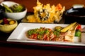 Dry aged ribeye SERVED WITH MISO SOUP, SALAD, TEMPURA, NOBU BISCUITS & GREEN TEA Royalty Free Stock Photo