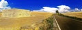 Dry agriculture land in contrast to a distant storm cloud during a heatwave in central Europe in jully 2018