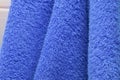 Dry bath towels are blue in the bathroom Royalty Free Stock Photo