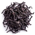 Dry black tea leaves isolated white background Royalty Free Stock Photo