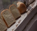 Dry bread slices on white windowsill. Royalty Free Stock Photo