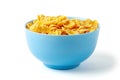 Dry breakfast cornflakes. Blue plate full of cereal. Isolated on white background. Royalty Free Stock Photo