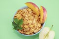 Dry Breakfast muesli and a natural green apple Royalty Free Stock Photo