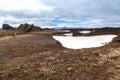 Dry broken volcanic lava, mountain and snow Landmannalaugar volcano landscape Royalty Free Stock Photo