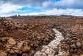 Dry broken volcanic lava, rocks and dirty snow Landmannalaugar volcano landscape Royalty Free Stock Photo