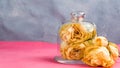 Dry buds of yellow roses on table. Symbol for floristry and perfumery. Romantic theme with free space for text Royalty Free Stock Photo