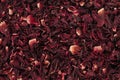 Dry carcade tea, a creative texture background, red flowers of hi