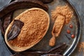 Dry carob powder and pods top view Royalty Free Stock Photo