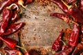 Dry chili peppers and powder Royalty Free Stock Photo