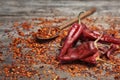 Dry chili peppers and powder Royalty Free Stock Photo