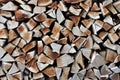 Dry chopped firewood in storage ready for use in cold winter sea Royalty Free Stock Photo