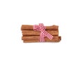 Dry cinnamon sticks tied with red ribbon Royalty Free Stock Photo