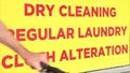 dry cleaning regular laundry cloth alteration writing caption text sign in red