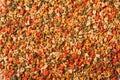 Dry colorful compound fish feed granules background