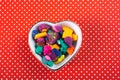 Dry colorful play dough in heart shaped bowl Royalty Free Stock Photo