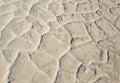 Dry cracked and caked lakebed in desert Royalty Free Stock Photo