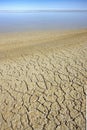 Dry, cracked earth in a dried up salt pan - Namibia Royalty Free Stock Photo