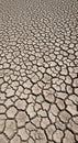 Dry, cracked earth with fragmented, polygonal shapes covers the surface. The Royalty Free Stock Photo
