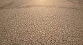 Dry Cracked Earth Texture Under Sunlight Royalty Free Stock Photo