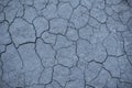 Dry cracked gray soil. Drought. Background Royalty Free Stock Photo