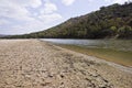 Dry Cracked Riverbed & River Royalty Free Stock Photo