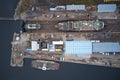 Dry dock and ship with shipbuilding in construction activity aerial view from above Greenock UK Royalty Free Stock Photo