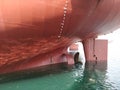 After dry dock ship undocked and trying out propeller and rudder Royalty Free Stock Photo