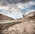 Dry earth and overcast sky Royalty Free Stock Photo