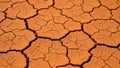 Dry earth with a reddish brown hue characteristic of arid or drought Royalty Free Stock Photo