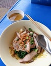 Dry egg noodle with wonton and roasted pork Royalty Free Stock Photo