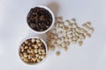 Dry fruits isolated in white pots