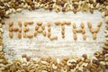 Dry fruits and nuts at wooden table. Healthy concept