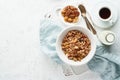 Dry granola in bowl. Breakfast, healthy diet food with milk in bottle Royalty Free Stock Photo