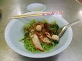 Dry green egg noodle with pork and green wonton