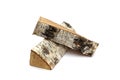 Several logs of birch firewood lie on a white background. Royalty Free Stock Photo