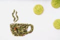 Dry herbal tea leaves in shape of cup Royalty Free Stock Photo