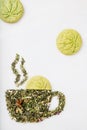 Dry herbal tea leaves in shape of cup Royalty Free Stock Photo